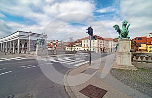 Empty streets on Ljubljanas Dragon bridge on spring Sunday morning, usually packed with people, due to coronavirus quarantine photo