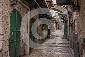 The empty streets and the stone stairs of the historic old city of Jerusalem.