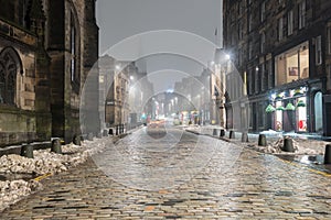Foggy Royal Mile in Edinburgh at Night photo