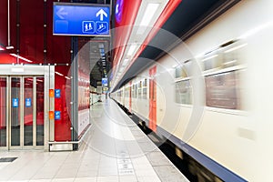 Empty subway station with speeding train, Brussels Belgium