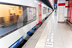 Empty subway station with speeding train, Brussels Belgium