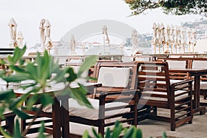 Empty summer beach cafe or restaurant, openair restaurant interior as background