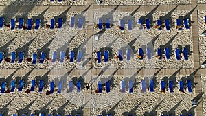 Empty sun loungers on the beach aerial view 4 K Turkey Alanya