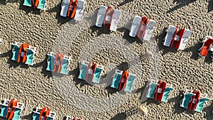Empty sun loungers on the beach aerial view 4 K Turkey Alanya