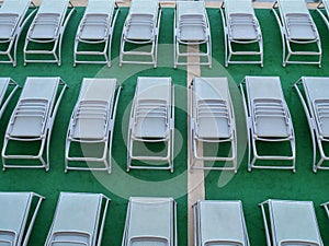 Empty sun loungers on the deck of a cruise ship