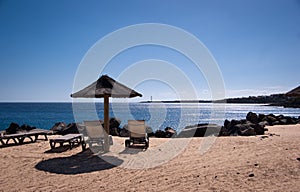 Empty sunbeds in playa blanca