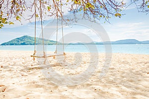 Empty swing on the beach at Rang yai island, Thailand