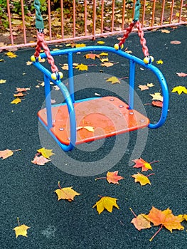Empty swing on playground