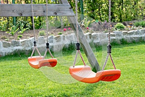 Empty swings in the garden