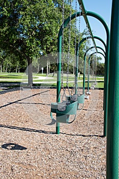 Empty swings in a playground