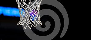 Empty Swooshing Basketball Net Close Up with Dark Background. Sports background for product display, banner, or mockup