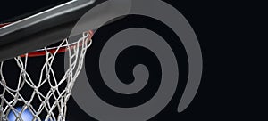 Empty Swooshing Basketball Net Close Up with Dark Background. Sports background for product display, banner, or mockup