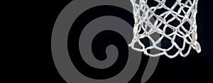 Empty Swooshing Basketball Net Close Up with Dark Background. Team sport conept