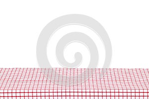 Empty table background. Empty wooden deck table covered with red white checkered tablecloth isolated on a white background. Space