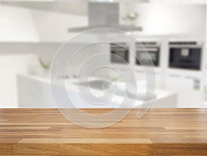 Empty table and blurred kitchen background