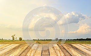 Empty table and blurred store with sky and clouds background, pr