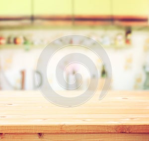 Empty table board and defocused retro kitchen background