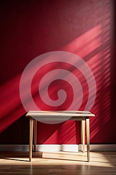 Empty Table with Dark Red Wall and Window Light Shadow