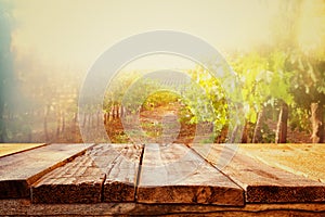 Empty table in front of dreamy countryside background