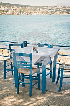 Empty table in greek cafe on Crete Island