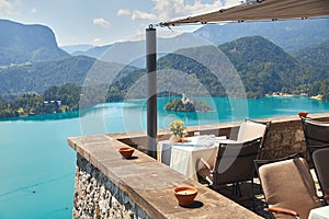 Empty table served with a view of beautiful Lake Bled