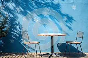 Empty table with blue wall background