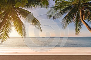 Empty table top with coconut palm tree and blue sky at tropical beach, Summer vacation concept