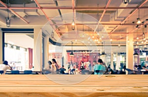 Empty table top counter with blurred coffee shop