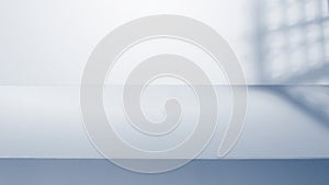 Empty table top with white concrete wall. Abstract pattern of concrete wall