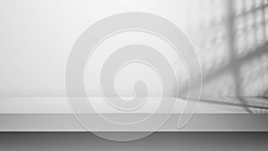 Empty table top with white concrete wall. Abstract pattern of concrete wall