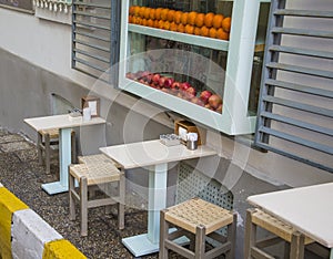 Empty tables and chairs outside of the restaurant in old city.