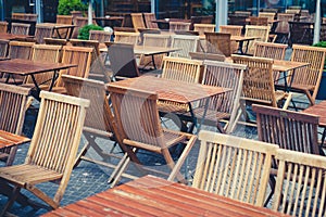 Empty tables and chairs in restaurant on day off