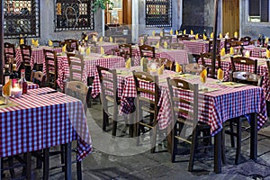 Empty tables at an outdoor restaurant