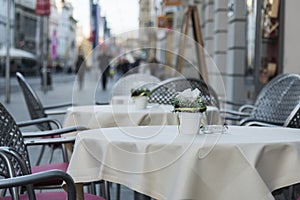 Empty tables on the street