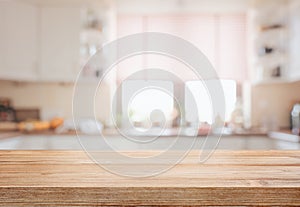 Empty tabletop over defocused kitchen