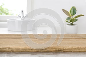 Empty tabletop for product display on blurred bathroom interior background