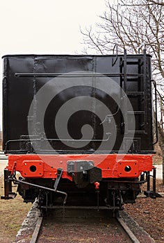Empty tender of old classic black steam locomotive