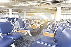 Empty terminal in Bangkok airport, waiting area at the gate with no passenger