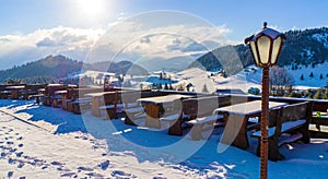 Empty terrace, winter in Fundata, Brasov county photo