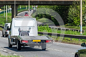 Empty tilt trailer truck on uk motorway in fast motion