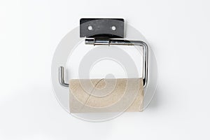 Empty toilet paper roll on a holder