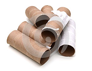 Empty toilet rolls on white background