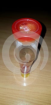 almost empty tomato sauce bottle normally being placed upside down to get the last drop of the sauce