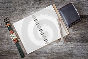 Empty top view of notebook on wooden background with retro style