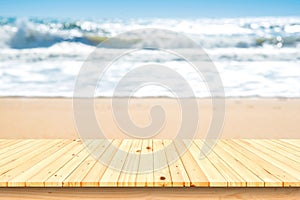 Empty top of wooden floor on the beach and blue sky,Ready for products.