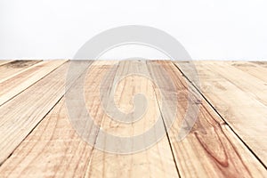 Empty top wooden table and cement wall background.