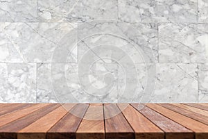 Empty top wooden table and stone wall background