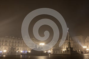 Empty town square in prague during late night hours. Almost noone is walking through the Prague city square