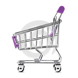 Empty toy shopping cart for shopping in a supermarket. Conceptual image of online stores