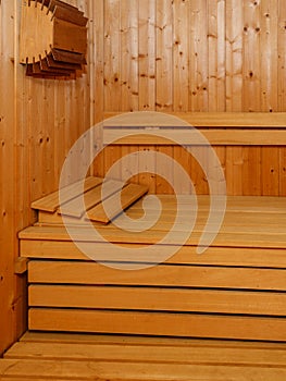 Empty traditional finnish sauna interior. Wooden bench in sauna room for relaxation